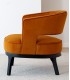 Butaca art decó en terciopelo mostaza con patas negras de fresno. 1