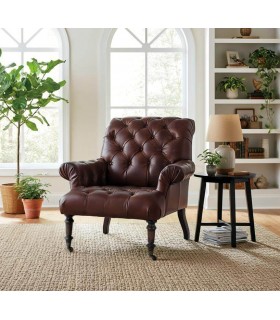 Butaca clásica tapizada en piel marrón con patas de madera. Mdmhogar