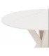 Mesa redonda beige de metal y porcelánico efecto mármol con vetas.2