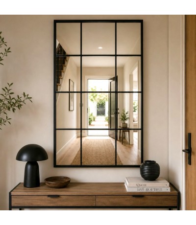 Espejo rectangular alto de metal negro con diseño industrial sobrio. Mdmhogar