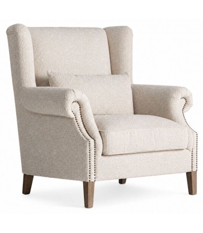Sillón orejero grande tapizado en chenilla blanco roto clásico