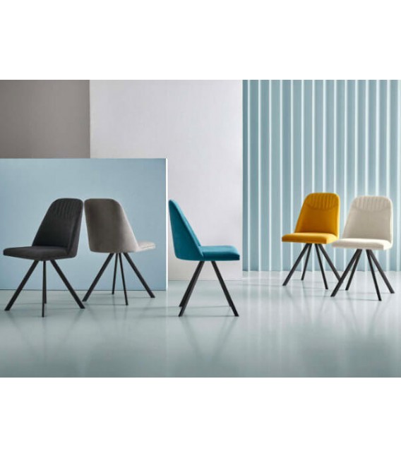 Silla tapizada asiento giratorio con sistema retorno diseño original.