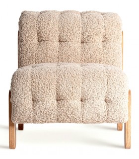 Sillón cómodo de estilo alpino tapizado en boucle de color beige mdmhogar