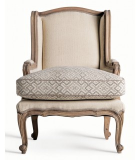 Sillón de orejas clásico con textil beige y estructura de madera.1