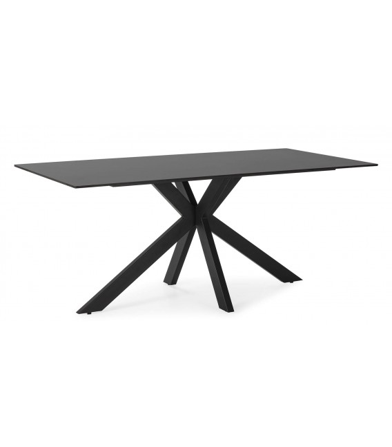 Mesa fija de comedor sobre cerámico negro base metálica en aspa.