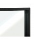 Espejo rectangular alto de metal negro con diseño industrial sobrio. 1