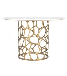 Mesa redonda de comedor en mármol blanco con base dorada calada. Mdmhogar