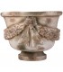 Macetero clásico con guirnalda floral en magnesia piedra envejecida. 1