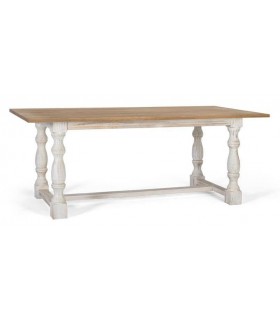 Mesa XL de comedor en madera natural y patas blancas torneadas.