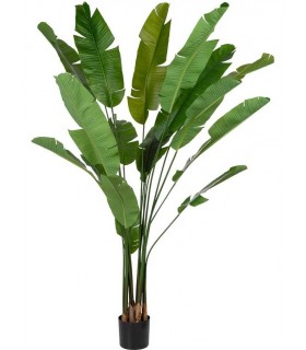 Planta artificial alta con hojas tropicales verdes y maceta negra.