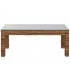 Mesa de centro boho con tapa de cristal y cuerpo de fibra natural.