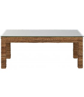 Mesa de centro boho con tapa de cristal y cuerpo de fibra natural.