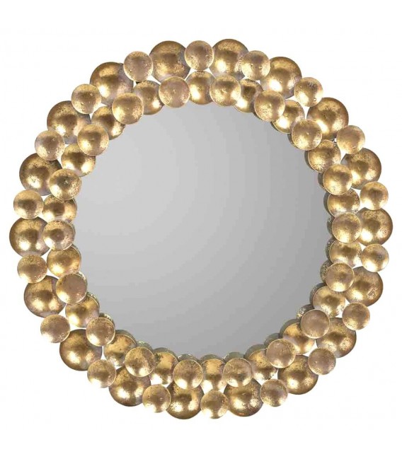 Espejo redondo estilo vintage con marco metálico en oro viejo.