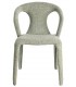 Silla tapizada en chenilla verde claro con diseño curvo y cómodo.1