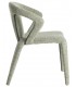 Silla tapizada en chenilla verde claro con diseño curvo y cómodo.2